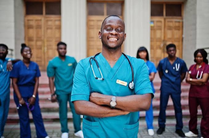 Group of clinical students outside their building