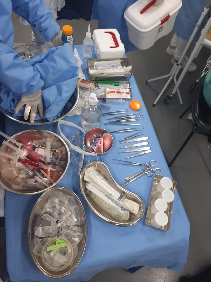 Tray of sterile surgical instruments